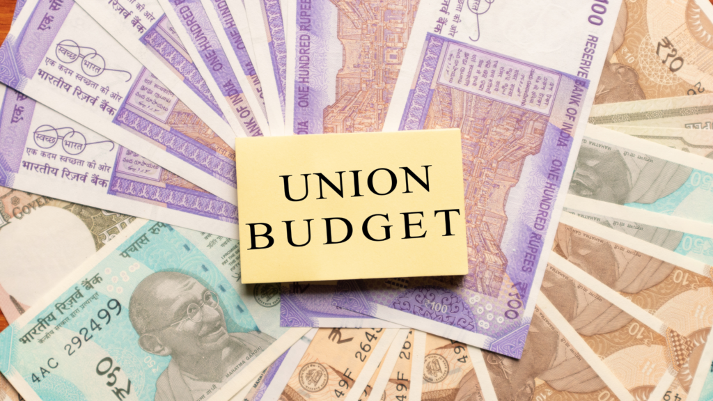 “Illustration of Union Budget with Indian currency notes in the background.”